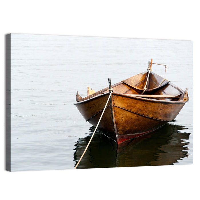 Tethered Wooden Rowboat on Calm Water Wall Art as a canvas print