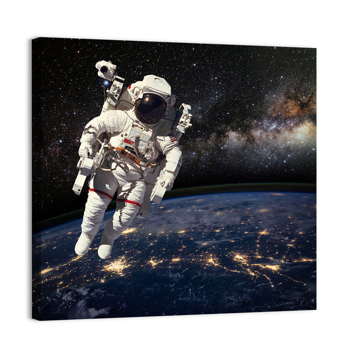Astronaut Above Earth Horizon Wall Art as a canvas print