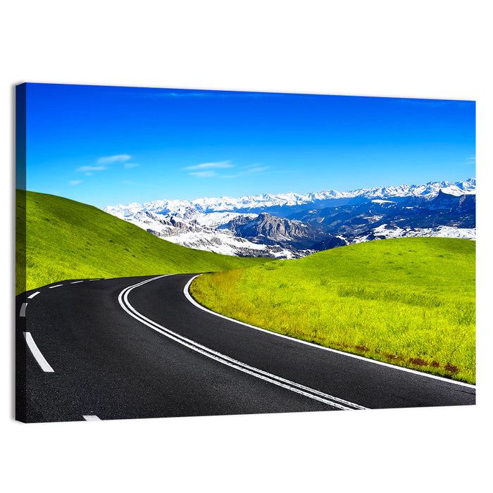 Winding Road Through Snow-capped Mountains Wall Art as a canvas print