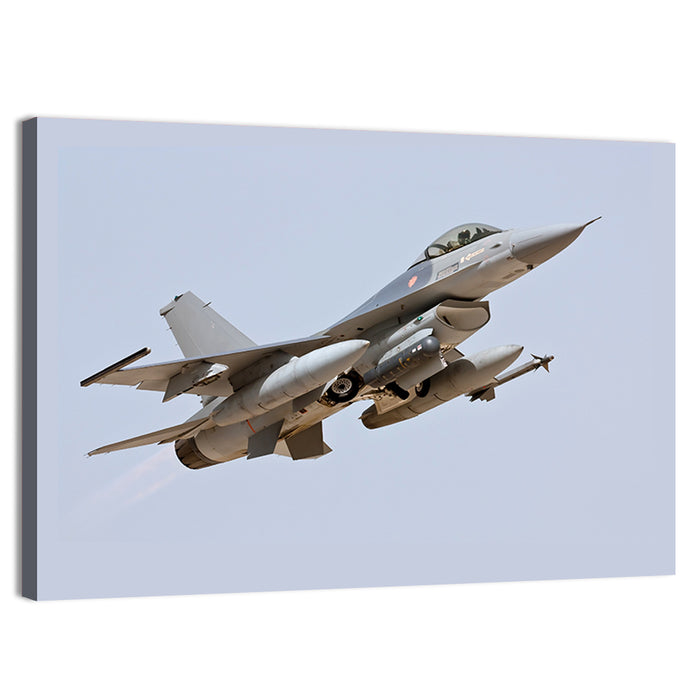 F-16 Fighter Jet Banking Over Sky Wall Art as a canvas print