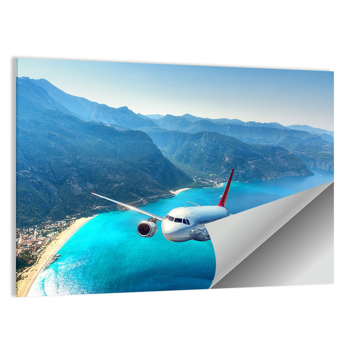 Airplane Over Turquoise Coast Wall Art as a poster print
