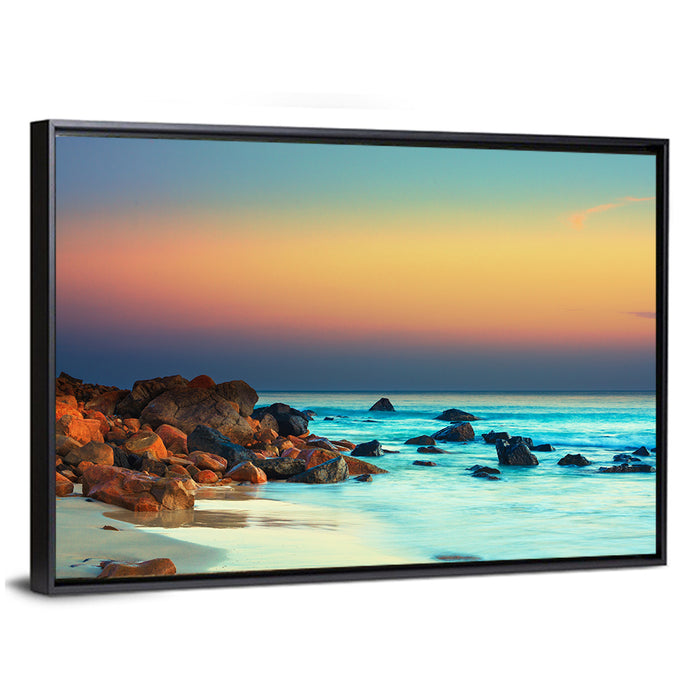 Sunset Over Volcanic Shoreline Wall Art as a framed canvas
