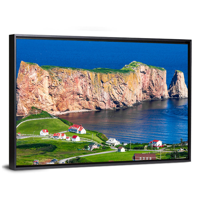 Percé Rock and Coastal Village, Quebec Wall Art as a framed canvas