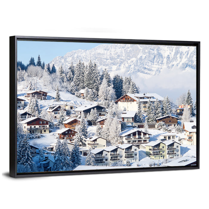 Snow Covered Swiss Alps Village Wall Art as a framed canvas