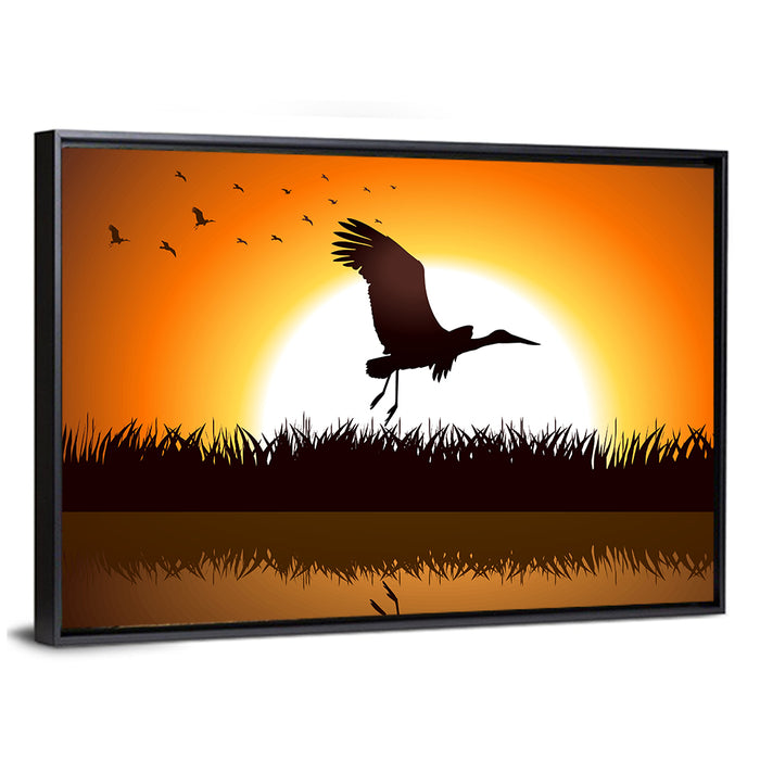 Stork Silhouette at Sunset Wall Art as a framed canvas