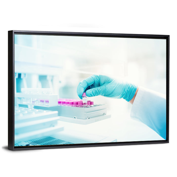 Gloved Hand Placing Vial in Laboratory Wall Art as a framed canvas