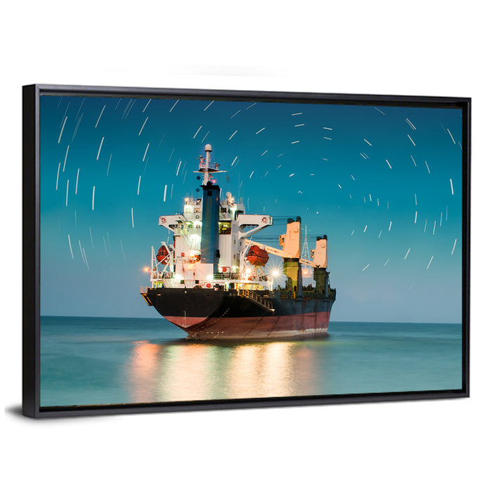 Cargo Ship Under Star Trail Sky Wall Art as a framed canvas