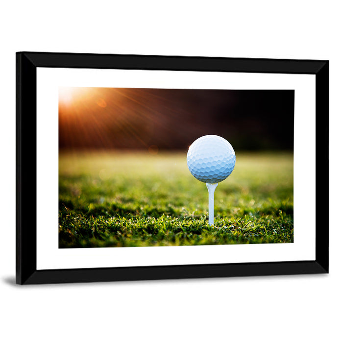 Golf Ball on Tee at Sunset Wall Art as a framed print