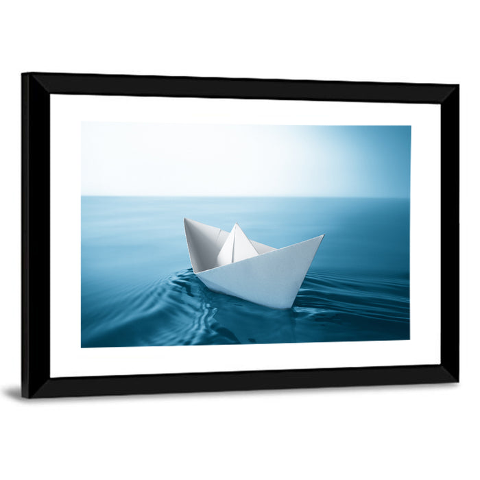 Paper Sailboat on Blue Water Wall Art as a framed print