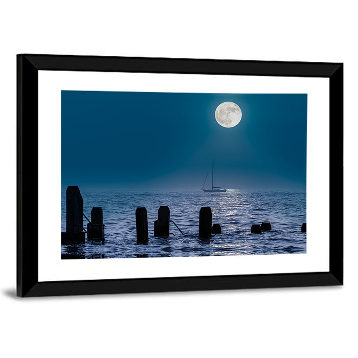 Moonlit Sailboat with Wooden Pylons Wall Art as a framed print