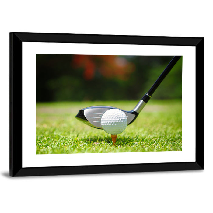 Golf Ball with Driver on Tee Wall Art as a framed print