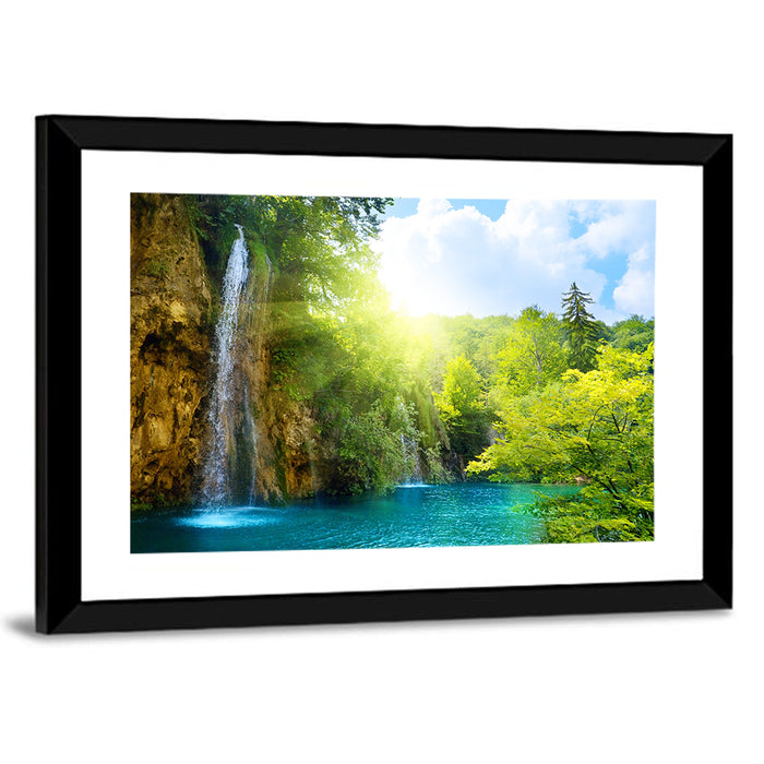 Forest Waterfall at Sunlit Lake Wall Art as a framed print