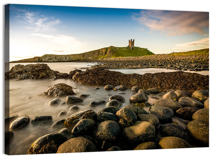 Dunstanburgh Castle at Golden Hour Wall Art as a canvas print