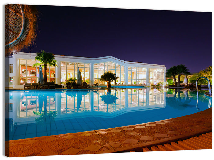 Moonlit Resort Pool Reflection Wall Art as a canvas print