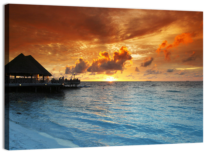 Overwater Bungalow Sunset Pier Wall Art as a canvas print