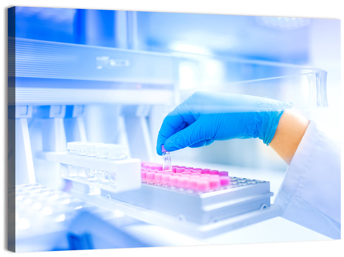 Gloved Hand with Vial and Pink-capped Tubes Wall Art as a canvas print