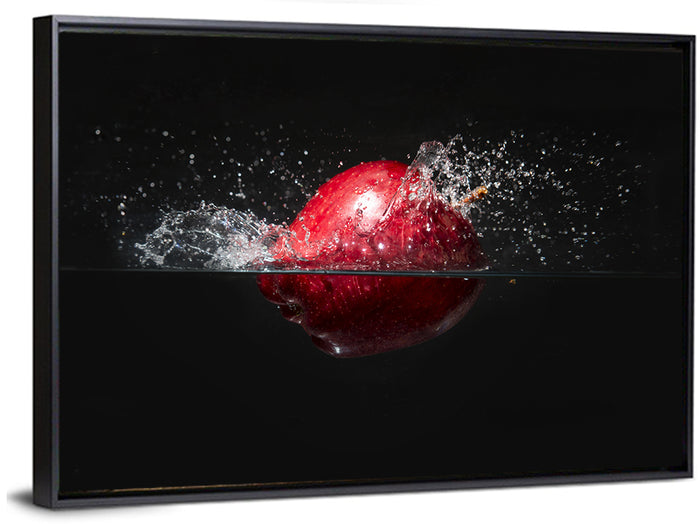 Red Apple Water Splash Wall Art as a framed canvas