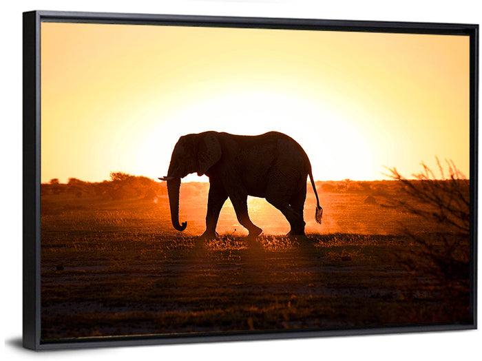 Golden Hour Elephant Silhouette Wall Art as a framed canvas