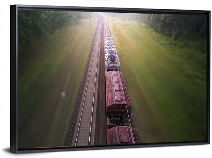 Freight Train Through Forest Wall Art as a framed canvas