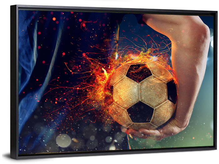 Fiery Soccer Ball and Blue Jersey Player Wall Art as a framed canvas
