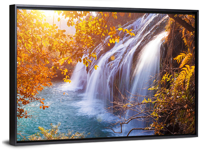 Golden Hour Waterfall in Autumn Forest Wall Art as a framed canvas