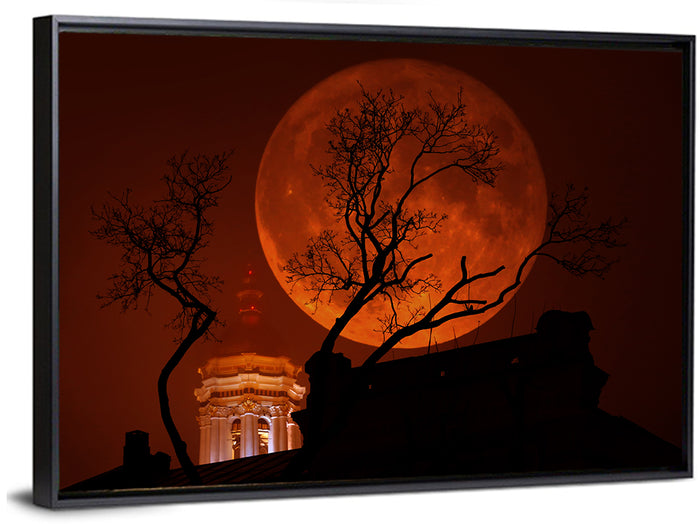 Haunted Supermoon Over Church Spire Wall Art as a framed canvas