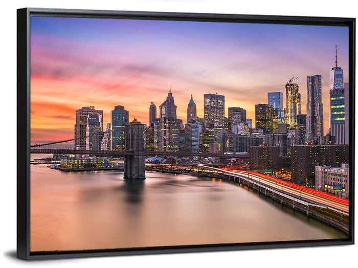 Brooklyn Bridge Light Trails Over Lower Manhattan Wall Art as a framed canvas