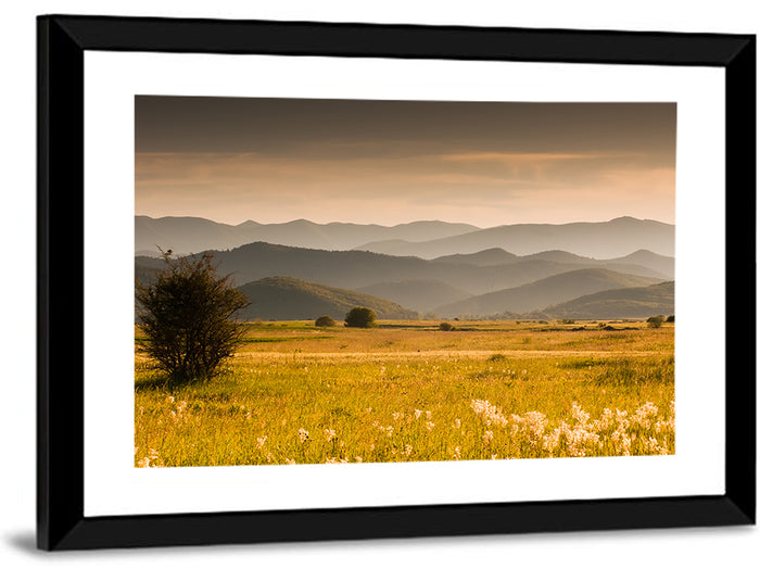 Golden Hour Countryside Hills Wall Art as a framed print