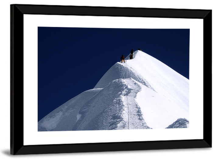Climbers on a Snowy Himalayan Peak Wall Art as a framed print