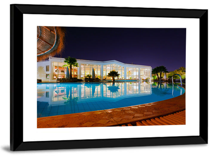 Moonlit Resort Pool Reflection Wall Art as a framed print