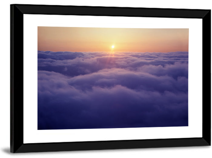 Sunset Over Endless Clouds Wall Art as a framed print