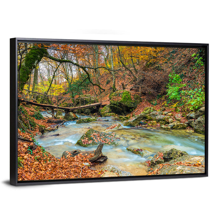 Mossy Footbridge in Autumn Forest Wall Art as a framed canvas