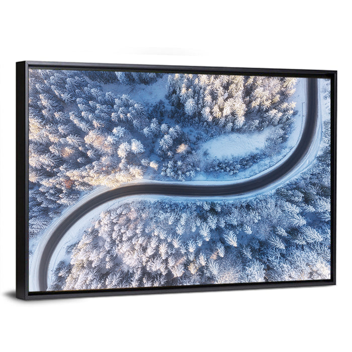 Winding Snow-covered Forest Road Wall Art as a framed canvas
