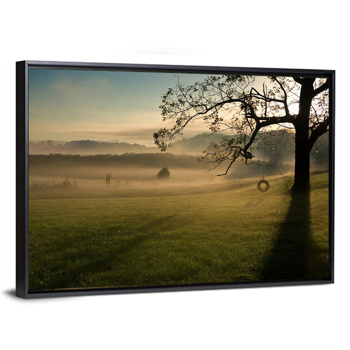 Tire Swing in Morning Mist Wall Art as a framed canvas