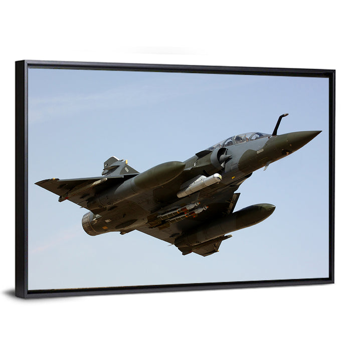 Camouflaged Fighter Jet in Flight Wall Art as a framed canvas