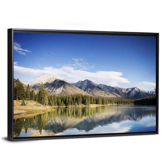 Minnewanka Lake Reflection Wall Art as a framed canvas