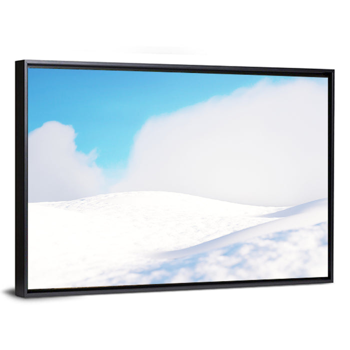 Snowy Hills Under Blue Sky Wall Art as a framed canvas
