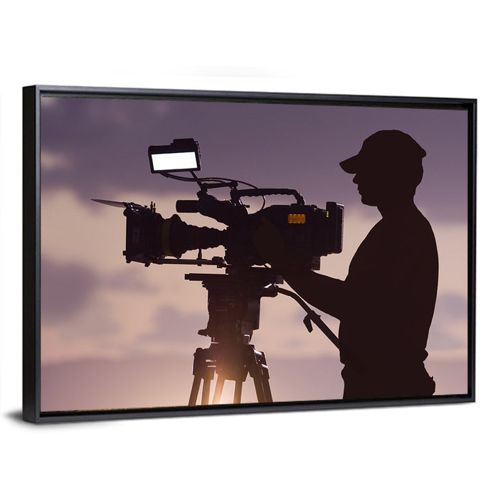 Cameraman Silhouette at Dusk Wall Art as a framed canvas