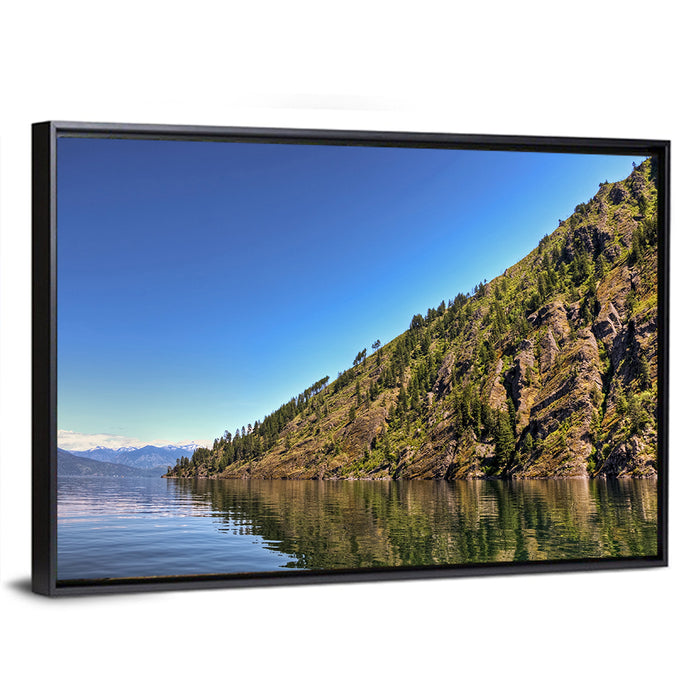Monarch Mountains Lake Wall Art as a framed canvas