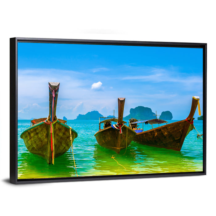 Three Long-tail Boats on Turquoise Water Wall Art as a framed canvas