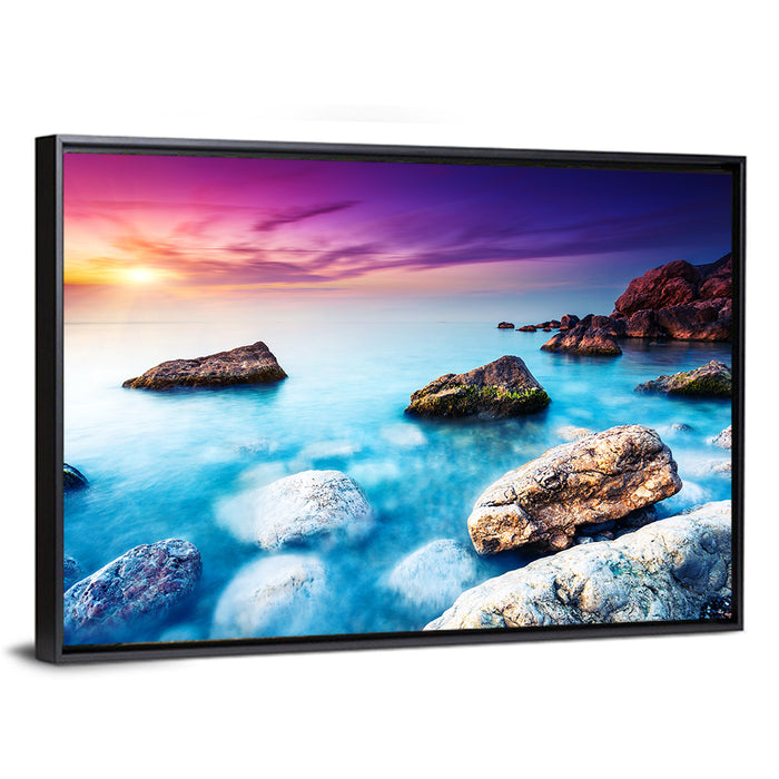 Rocky Beach Sunset Wall Art as a framed canvas