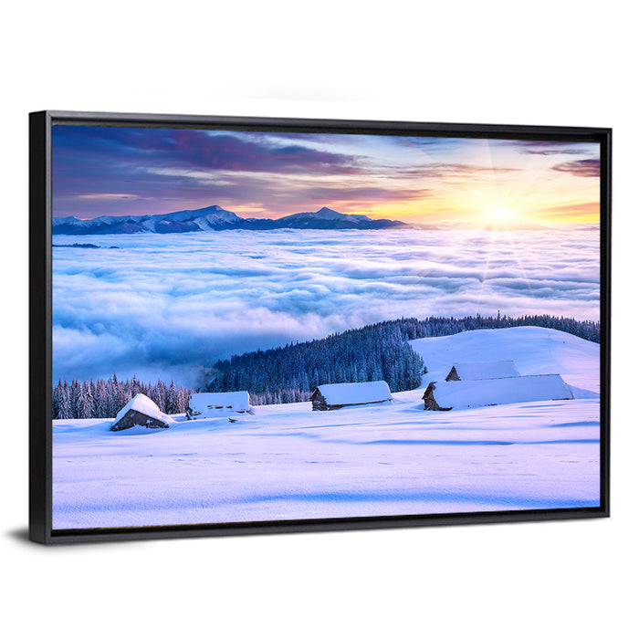 Snowy Cabins Above Clouds Wall Art as a framed canvas