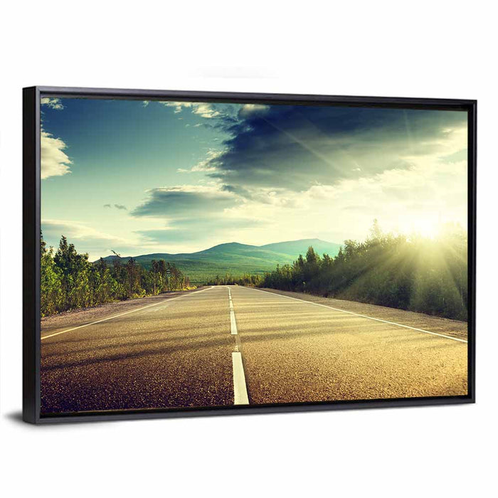 Sunlit Asphalt Road Wall Art as a framed canvas