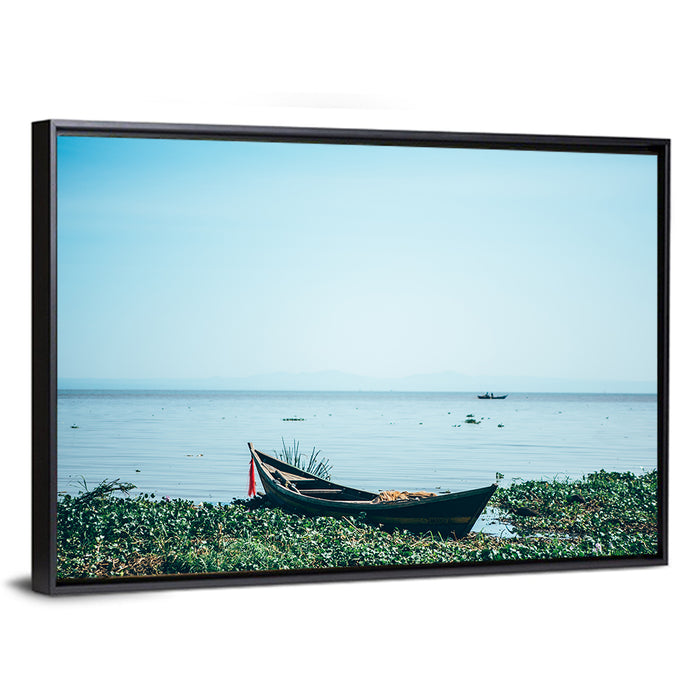 Red Ribbon Boat on Lake Victoria Wall Art as a framed canvas