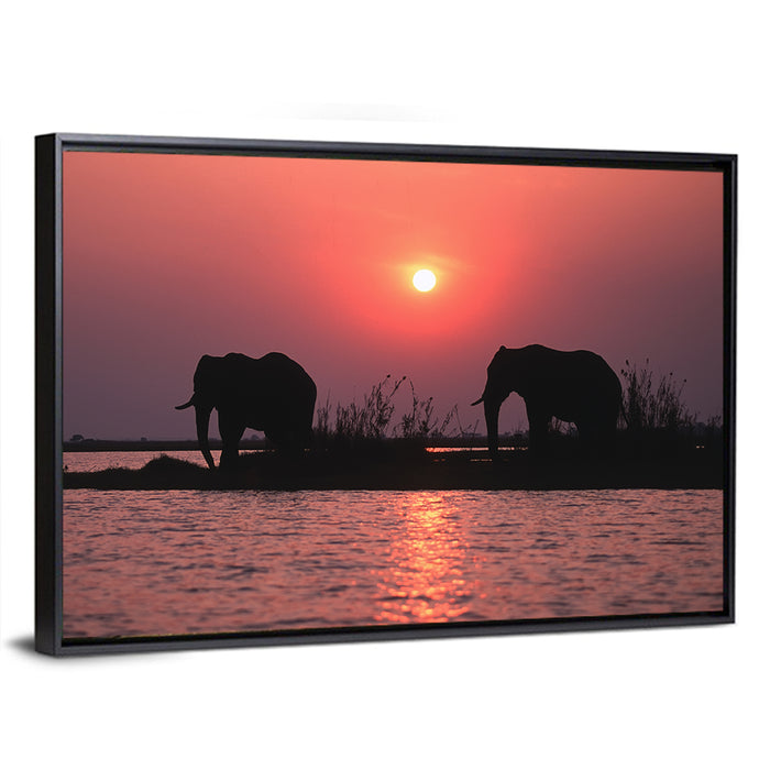 Elephants at Sunset Silhouette Wall Art as a framed canvas