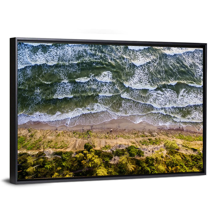 Aerial Waves Over Sandy Cliff Wall Art as a framed canvas