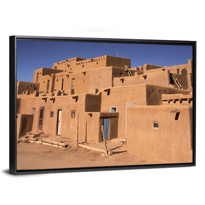 Taos Pueblo North House Wall Art as a framed canvas