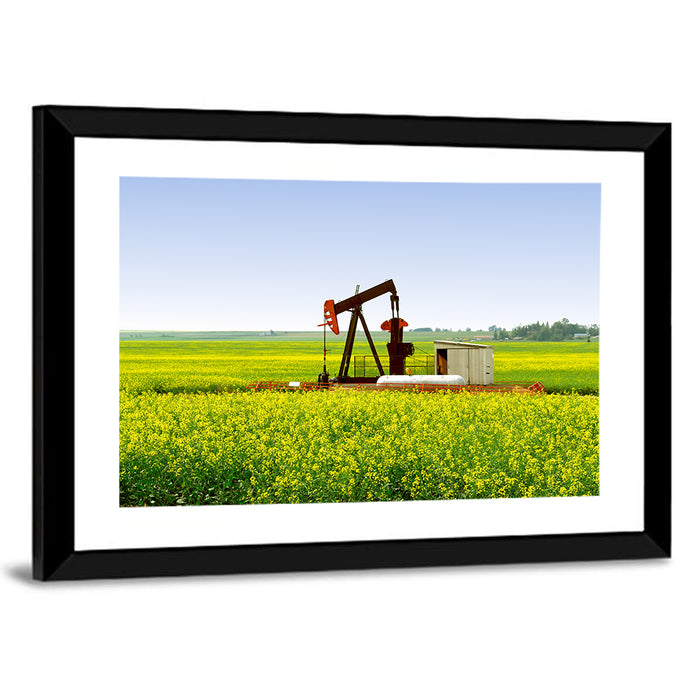 Rusty Pumpjack in Yellow Canola Field Wall Art as a framed print