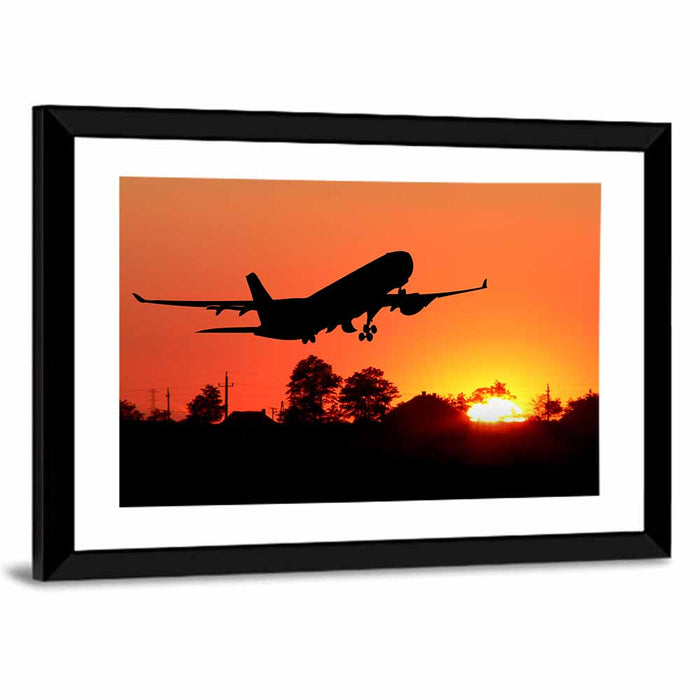 Airplane Taking Off at Sunset Wall Art as a framed print