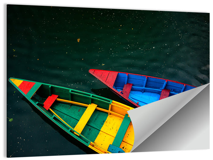 Two Colorful Boats Over Rippling Water Wall Art as a poster print